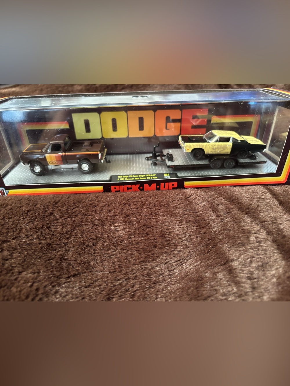 Die cast 1969 Plymouth road runner & 1979 150 power wagon collector